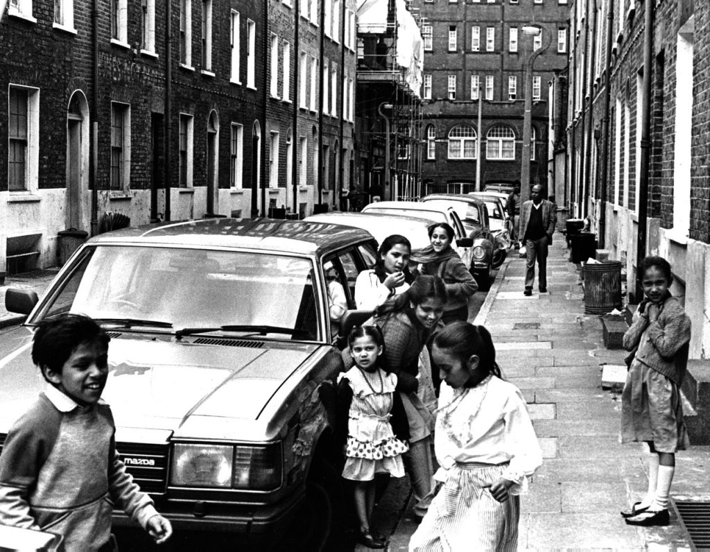 Kids playing in the street in the 80s